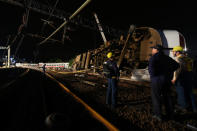 Rescuers search an overturned train in Yilan, Taiwan October 21, 2018. REUTERS/Lee Kun Han