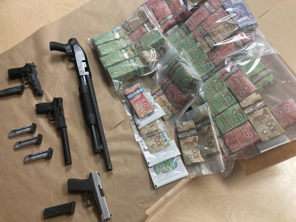 RCMP say they seized a number of items in a bust last week, including handguns, a shotgun, over 10 kg of 'what is believed to be cocaine,' as well as other drugs in smaller quantities. (Meribeth Deen/CBC - image credit)