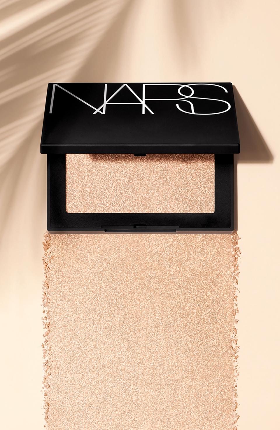 <p><strong>NARS</strong></p><p>nordstrom.com</p><p><strong>$32.30</strong></p><p><a rel="nofollow noopener" href="https://shop.nordstrom.com/s/nars-highlighting-powder/4842271" target="_blank" data-ylk="slk:SHOP;elm:context_link;itc:0;sec:content-canvas" class="link ">SHOP</a></p><p>Not only is this the silkiest and softest highlighter we've ever tried, but it also leaves behind the most natural-looking and non-glittery sheen. Apply it with a fluffy brush for a subtle glow, or use a stiff, flat brush for serious shine.</p>