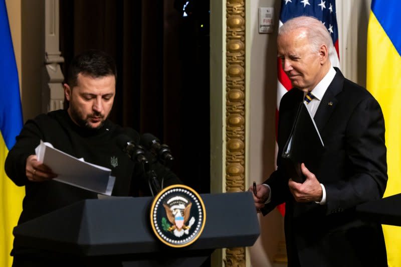 U.S. President Joe Biden (R) and Ukrainian President Volodymyr Zelensky depart after giving remarks in the Indian Treaty Room of the Eisenhower Executive Office Building after meeting in the White House's Oval Office in Washington, D.C., on Tuesday. Photo by Julia Nikhinson/UPI