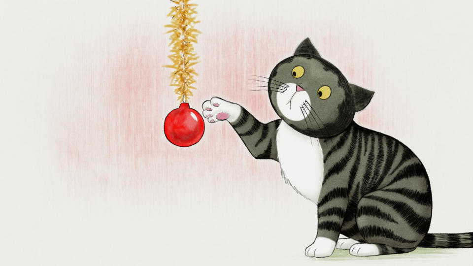 Mog plays with a bauble.