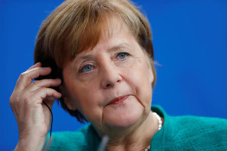 Chancellor Angela Merkel during a news conference with Polish Prime Minister Mateusz Morawiecki in Berlin, Germany, February 16, 2018. REUTERS/Hannibal Hanschke