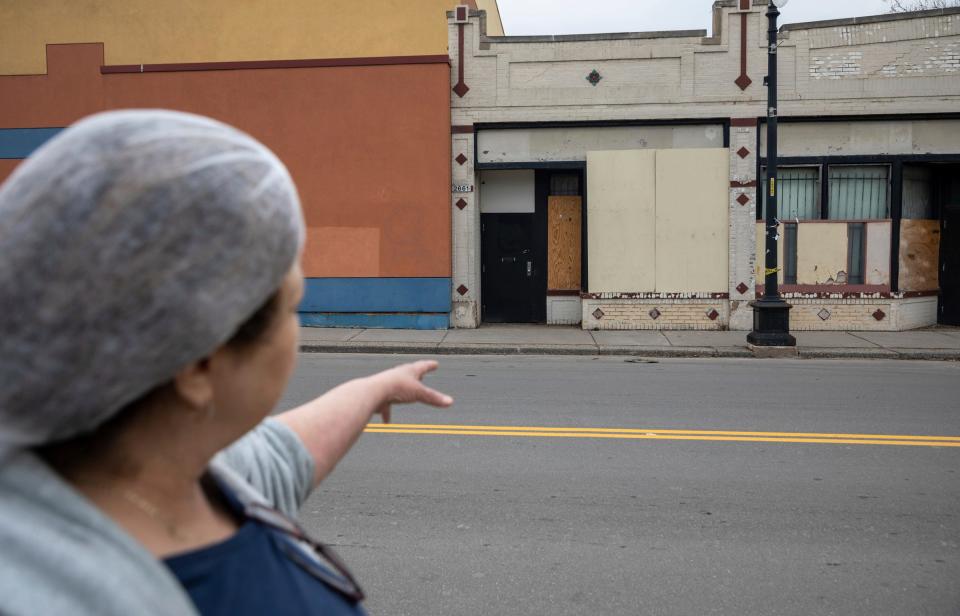 Tamaleria Nuevo Leon owner Susana "Suzy" Villarreal-Garza points at the old building on Bagley Street where Tamaleria Nuevo Leon was before they moved to its current location at 2669 Vernon Highway, as she walks during early morning on Thursday, March 2, 2023.