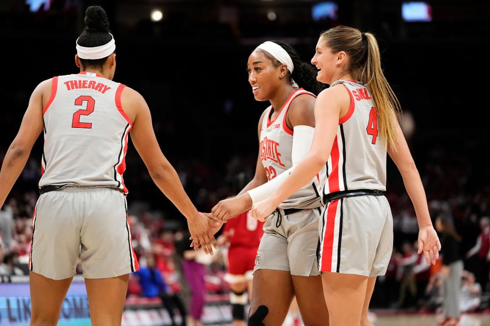 Ohio State's Taylor Thierry (2),Cotie McMahon (32) and Jacy Sheldon (4) started every game for the Buckeyes this year.
