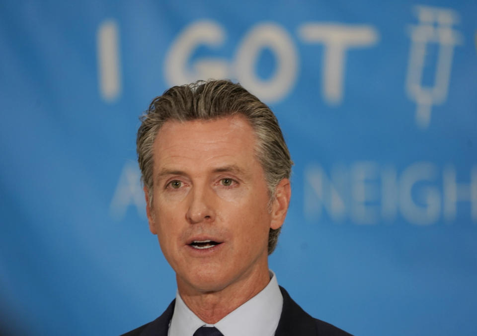 California Gov. Gavin Newsom announces a massive jackpot as the nation's most populous state looks to encourage millions of people who are still unvaccinated to get their shots at a news conference at the Esteban E. Torres High School in Los Angeles, Thursday, May 27, 2021. California is giving away the country's largest pot of vaccine prize money — $116.5 million — in an attempt to get millions more inoculated before the most populous U.S. state fully reopens next month. Newsom on Thursday announced the prizes, which also include the nation's highest single vaccine prize: $1.5 million. (AP Photo/Damian Dovarganes)