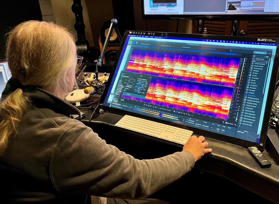 Wiley Ross, director of the University of Arizona's music department recording studio, demonstrates how he engineered the sound for Sara Fraker's Pine Chant recording.