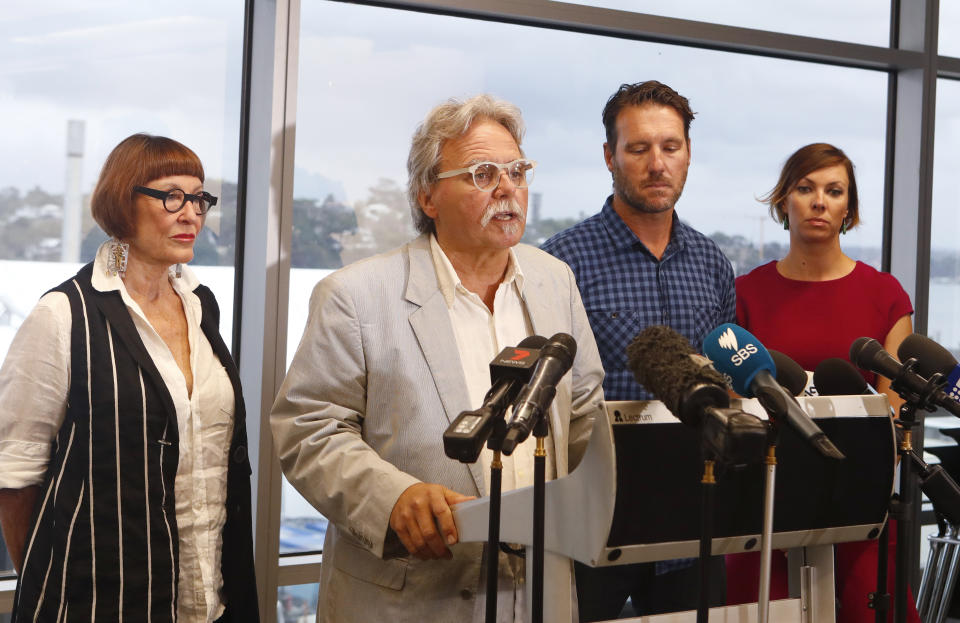 John Ruszczyk (second left), the father of Australian woman Justine Damond Ruszczyk, accompanied by his wife Marian Hefferen (left), Jason Ruszczyk (second right) and his wife Katarina, read a statement in front of the media in Sydney, Thursday, December 21, 2017. Justine Damond's father is worried the US prosecutor investigating her death believes the initial investigation was not done accurately or thoroughly enough. Justine was killed by a US police officer in Minneapolis in July this year. (AAP Image/Daniel Munoz) NO ARCHIVING