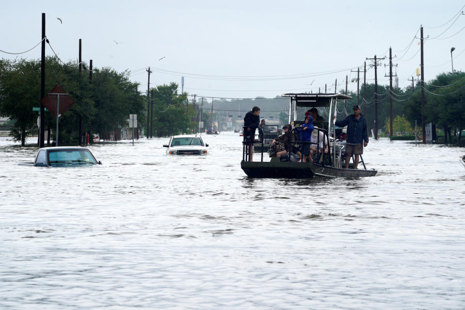 The main street is covered by floodwaters from Hurricane Harvey in Dickinson, Texas, Aug. 27, 2017. (Rick Wilking/Reuters)