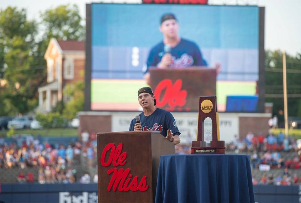 Ole Miss baseball’s Brandon Johnson addresses a packed crowd during a celebration for the National Champion Rebel baseball team, winners of the College World Series, at Swayze Field in Oxford, Miss., Wednesday, June 29, 2022.<br>Tcl Olemiss