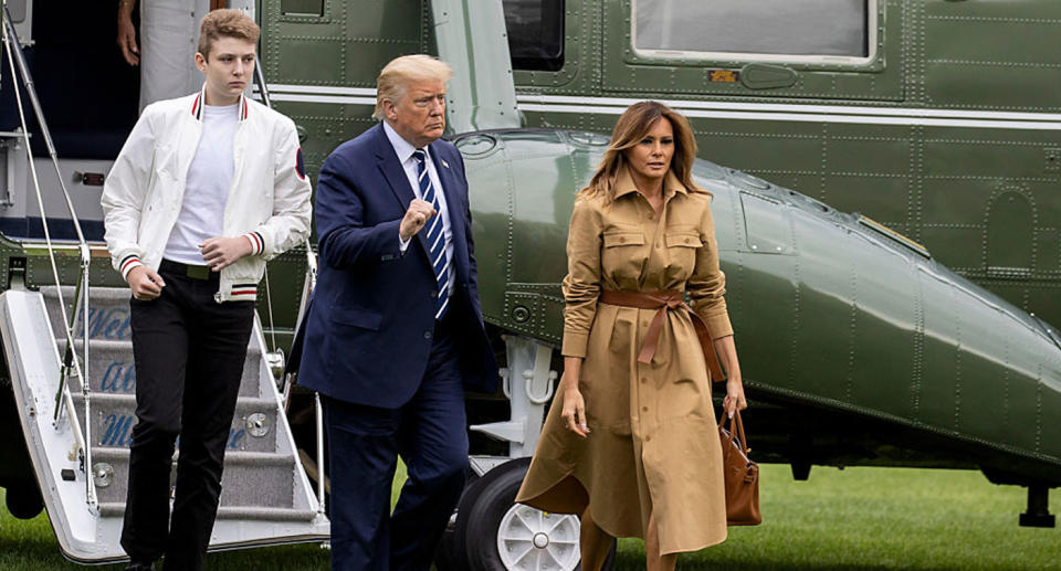 Barron Trump pictured with his father, Donald, and mother Melania. Source: Tasos Katopodis/Getty Images