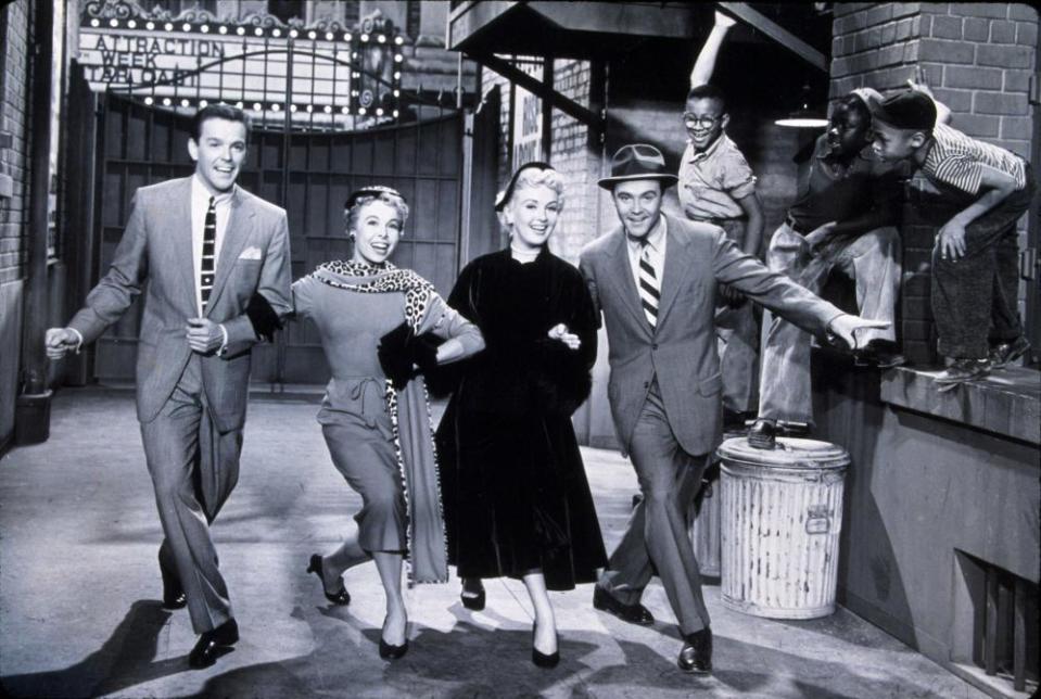 Marge Champion, second from left, with, from left, Gower Champion, Betty Grable and Jack Lemmon in Three for the Show, 1955.