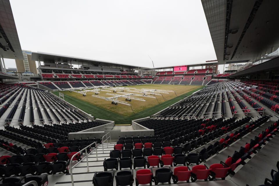 Empty seats are seen inside CityPark Stadium Friday, Jan. 13, 2023, in St. Louis. When season tickets sales began for Major League Soccer's newest team, St. Louis City SC leaders figured they'd be a hot ticket in a city with a deep love for the sport. (AP Photo/Jeff Roberson)