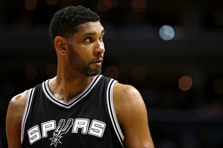 Tim Duncan helped the San Antonio Spurs match a club record with 67 wins and an NBA record with a 40-1 showing in home games