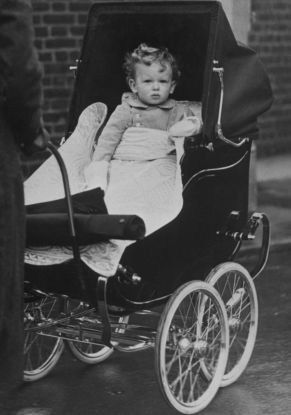 <p>A one-year-old Prince Edward in his stroller.</p>