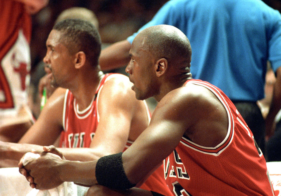 Chicago Bulls # 23 Michael Jordan  sitting next to Bill Cartwright on the bench during the Chicago Bulls vs New York Knicks game on May 14 , 1993 at Madison Square Garden. (Photo by Tom Berg/WireImage)