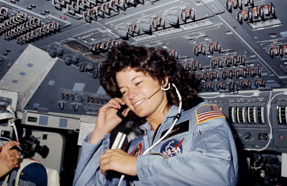 Astronaut Sally K. Ride, STS-7 mission specialist and first American woman in space, is seen here on the flight deck of the space shuttle Challenger, June 18, 1983.