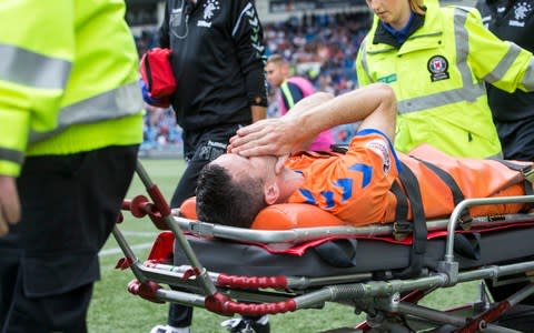 Jamie Murphy is stretchered off with a knee injury - Jamie Murphy being stretchered off with a knee injury could prove a costly loss - Credit: PA