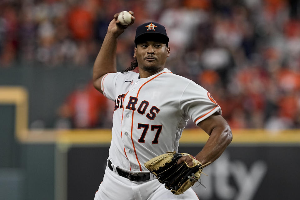 Houston Astros starting pitcher Luis Garcia throws against the Boston Red Sox during the first inning in Game 6 of baseball's American League Championship Series Friday, Oct. 22, 2021, in Houston. (AP Photo/Tony Gutierrez)