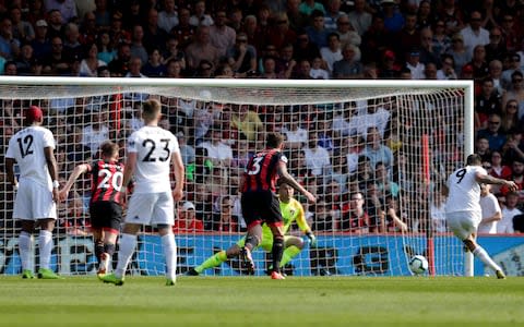 Aleksandar Mitrovic of Fulham scores his team's first goal from the penalty spot during the Premier League match between AFC Bournemouth and Fulham FC at Vitality Stadium on April 20, 2019 in Bournemouth, United Kingdom - Credit: Getty Images