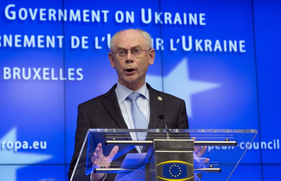 European Council President Herman Van Rompuy gestures while speaking during a media conference after an EU summit in Brussels on Thursday, March 6, 2014. European Union leaders are holding an emergency summit to decide on imposing sanctions against Russia over its military incursion in Ukraine's Crimean peninsula. (AP Photo/Virginia Mayo)