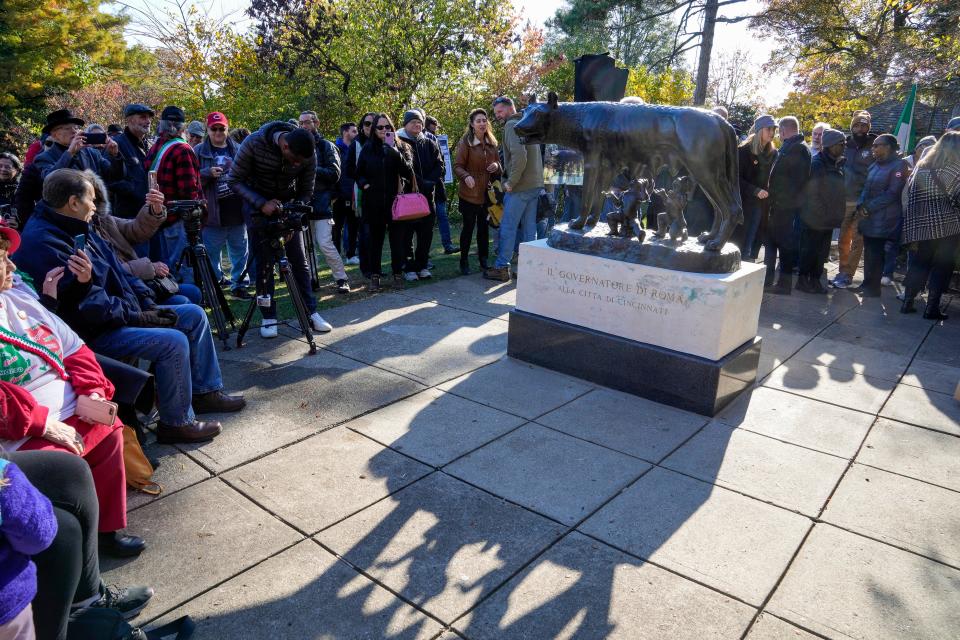 More than 100 people gathered at Eden Park on Friday to celebrate the return of the she-wolf statue with Italian music and food.