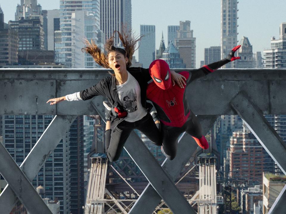 MJ and Spider-Man jumping off a platform in "Spider-Man: No Way Home."