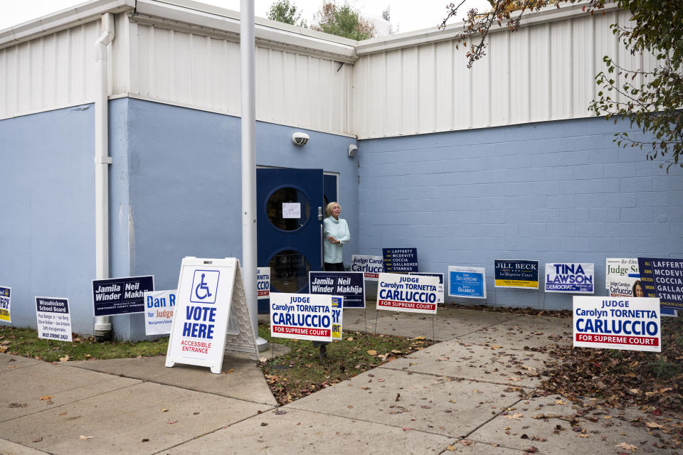 Gwendolyn Gordon exits the Wissahickon Valley Public Library after voting for Carolyn Carluccio on Election Day in Blue Bell, Pa. on Tuesday, Nov. 7, 2023. (AP Photo/Joe Lamberti)