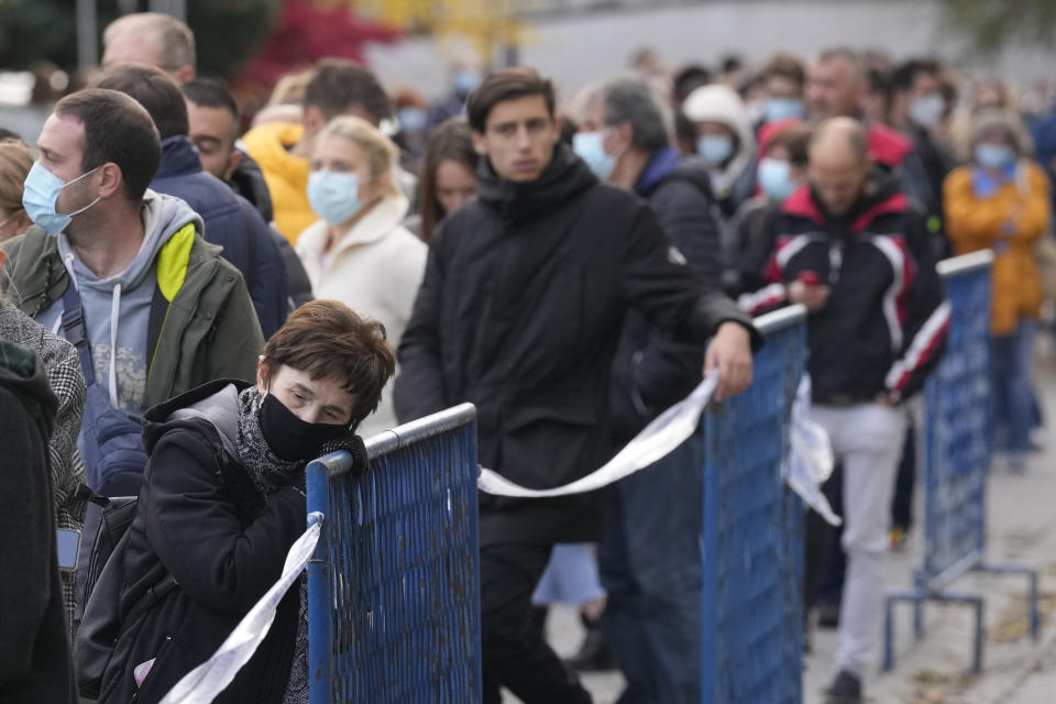 People wait to be vaccinated against COVID-19 in Zagreb, Croatia, Thursday, Nov. 4, 2021. Countries throughout Central and Eastern Europe reported spiraling coronavirus cases Thursday, with several hitting new daily records in the regions that have lower vaccination rates than the rest of the continent. Croatia, Slovenia and Slovakia reported their highest numbers of daily cases of the pandemic, while other countries registered the most infections in months. (AP Photo/Darko Bandic)