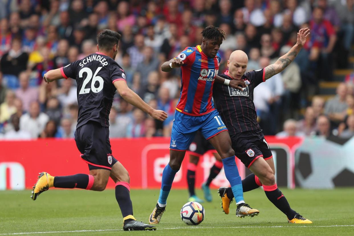 Zaha picked up the injury against Huddersfield: Getty Images