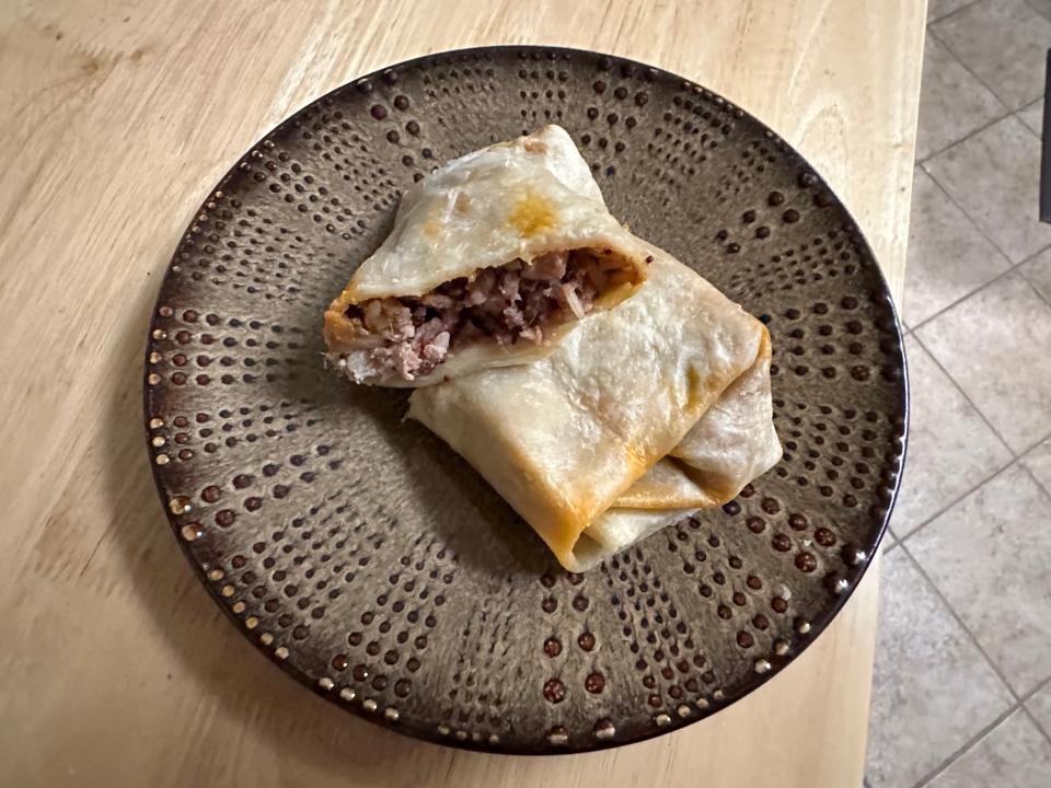 trader joe's turkey and sweet potato burrito cooked on brown plate