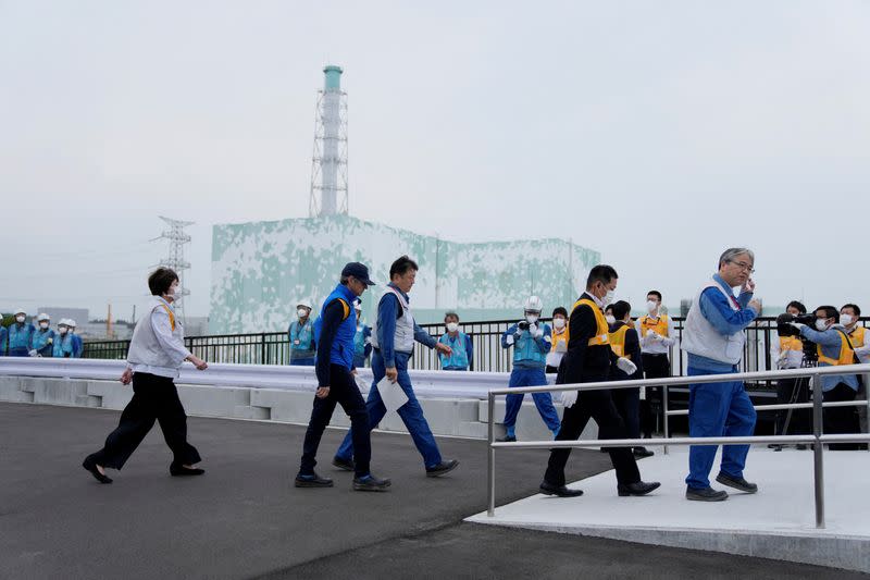 FILE PHOTO: Director General of the IAEA Grossi visits the damaged Fukushima nuclear power plant