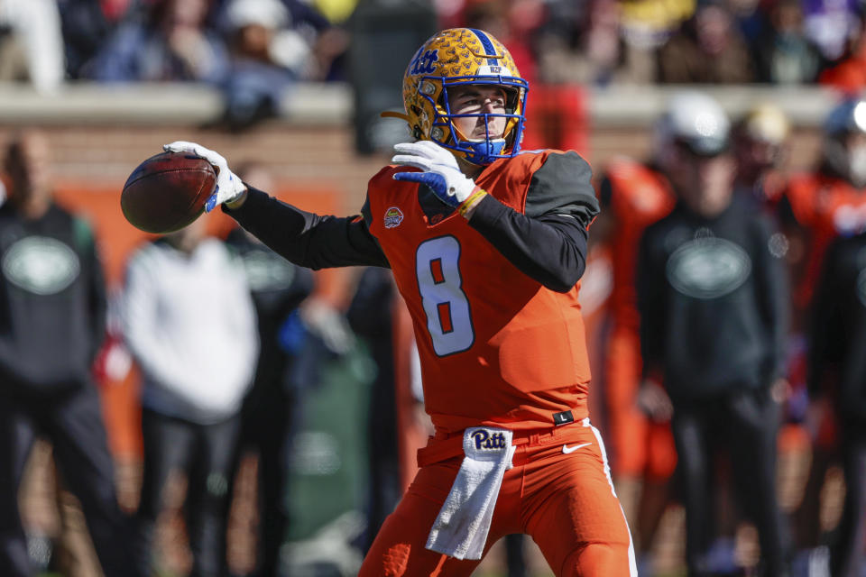 National Team quarterback Kenny Pickett, of Pittsburgh, throws a pass during the first half of an NCAA Senior Bowl college football game, Saturday, Feb. 5, 2022, in Mobile, Ala. (AP Photo/Butch Dill)