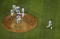 Los Angeles Dodgers relief pitcher Dylan Floro leaves the game against the Tampa Bay Rays during the third inning in Game 2 of the baseball World Series Wednesday, Oct. 21, 2020, in Arlington, Texas. (AP Photo/David J. Phillip)