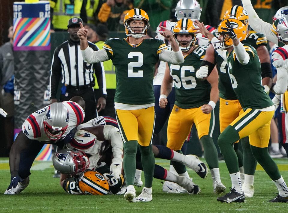 Mason Crosby reacts after kicking a game-winning field goal in overtime against the New England Patriots on Oct. 2, 2022. He hit another one against the Cowboys at Lambeau Field to end a six-game losing streak for the Packers. The 2022 season was likely Crosby's last in Green Bay.