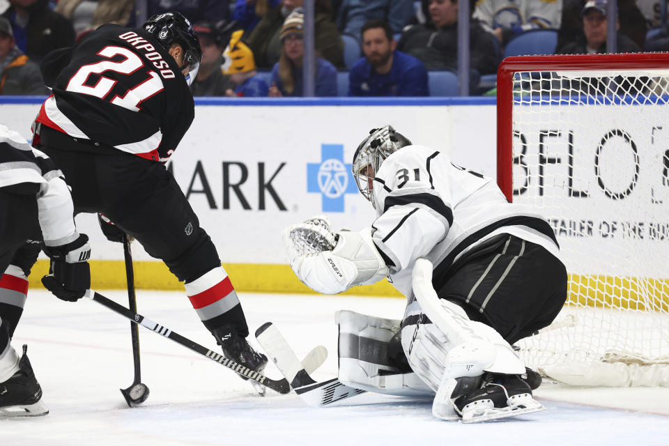 Buffalo Sabres right wing Kyle Okposo (21) is stopped by Los Angeles Kings goaltender David Rittich (31) during the first period of an NHL hockey game Tuesday, Feb. 13, 2024, in Buffalo, N.Y. (AP Photo/Jeffrey T. Barnes)