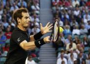 Andy Murray of Britain hits a return to Tomas Berdych of Czech Republic during men's singles semi-final match at the Australian Open 2015 tennis tournament in Melbourne January 29, 2015. REUTERS/Thomas Peter (AUSTRALIA - Tags: SPORT TENNIS)