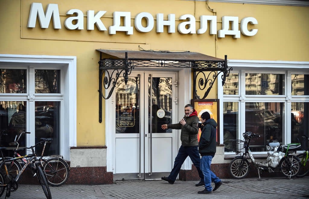 People enter a McDonald’s restaurant in Moscow (AFP via Getty Images)