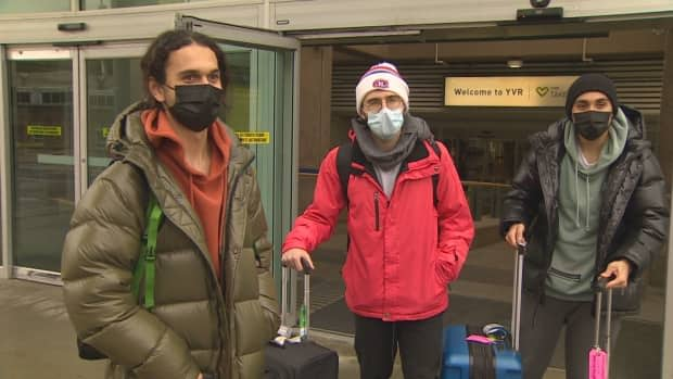 'I'm just here to go skiing and enjoy my time off,' said the traveller from Quebec on the left.