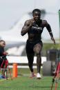Houston wide receiver Marquez Stevenson competes in the 40-yard dash at a NFL football mini combine organized by House of Athlete, Friday, March 5, 2021, in Fort Lauderdale, Fla. (AP Photo/Marta Lavandier)