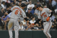Baltimore Orioles' Adley Rutschman (35) celebrates with Ryan Mountcastle (6) after hitting a two-run home run against the Chicago White Sox during the fourth inning of a baseball game Thursday, June 23, 2022, in Chicago. (AP Photo/Paul Beaty)