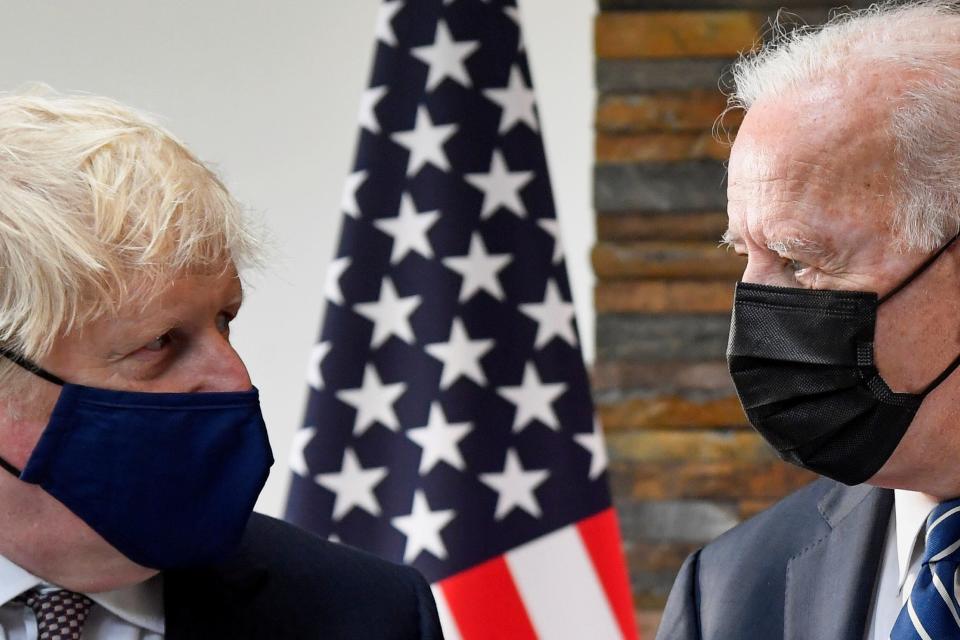 President Joe Biden, right, talks with Britain's Prime Minister Boris Johnson, during their meeting ahead of the G7 summit in Cornwall, Britain, on June 10, 2021.