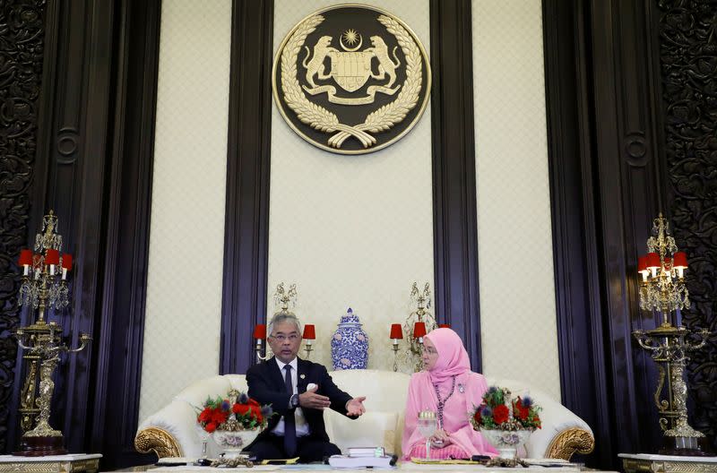 Malaysia's King Al-Sultan Abdullah, accompanied by Queen Tunku Azizah Aminah Maimunah Iskandariah, speaks during an interview at National Palace in Kuala Lumpur