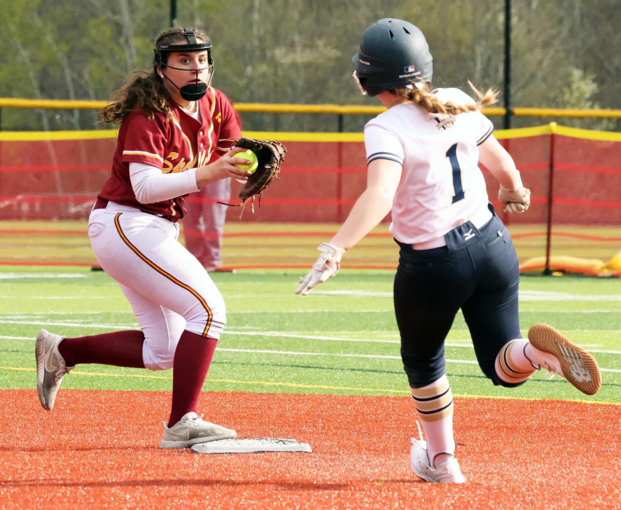 Cardinal Spellman shortstop Lucy LaCara makes the force out on Archbishop Williams runner Ciara McMenamin during a game on Tuesday, April 25, 2023. 