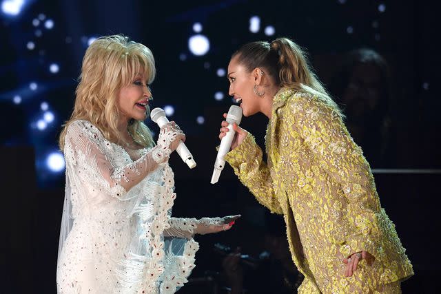 ROBYN BECK/AFP/Getty Dolly Parton and Miley Cyrus, February 2019