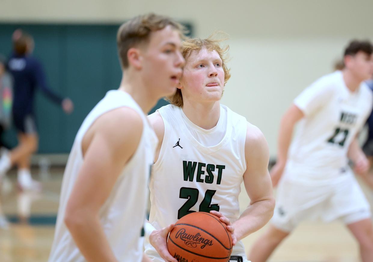 The Zeeland West boys basketball team defeated Hudsonville Unity Christian on Friday, Dec. 1, 2023.