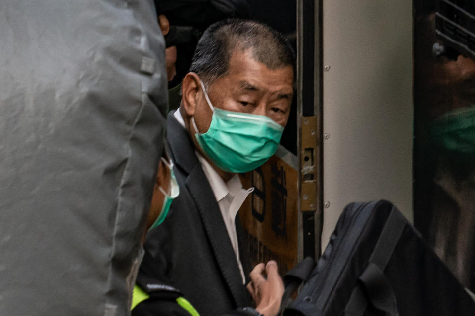 HONG KONG, CHINA - FEBRUARY 01: Jimmy Lai, media tycoon and the Apple Daily founder, boards a Correctional Services Department vehicle as he leaves the Court of Final Appeal following a bail hearing on February 1, 2021 in Hong Kong, China. The Court of Final Appeal has reserved judgement in an appeal case with Lai being remanded in custody. (Photo by Anthony Kwan/Getty Images)