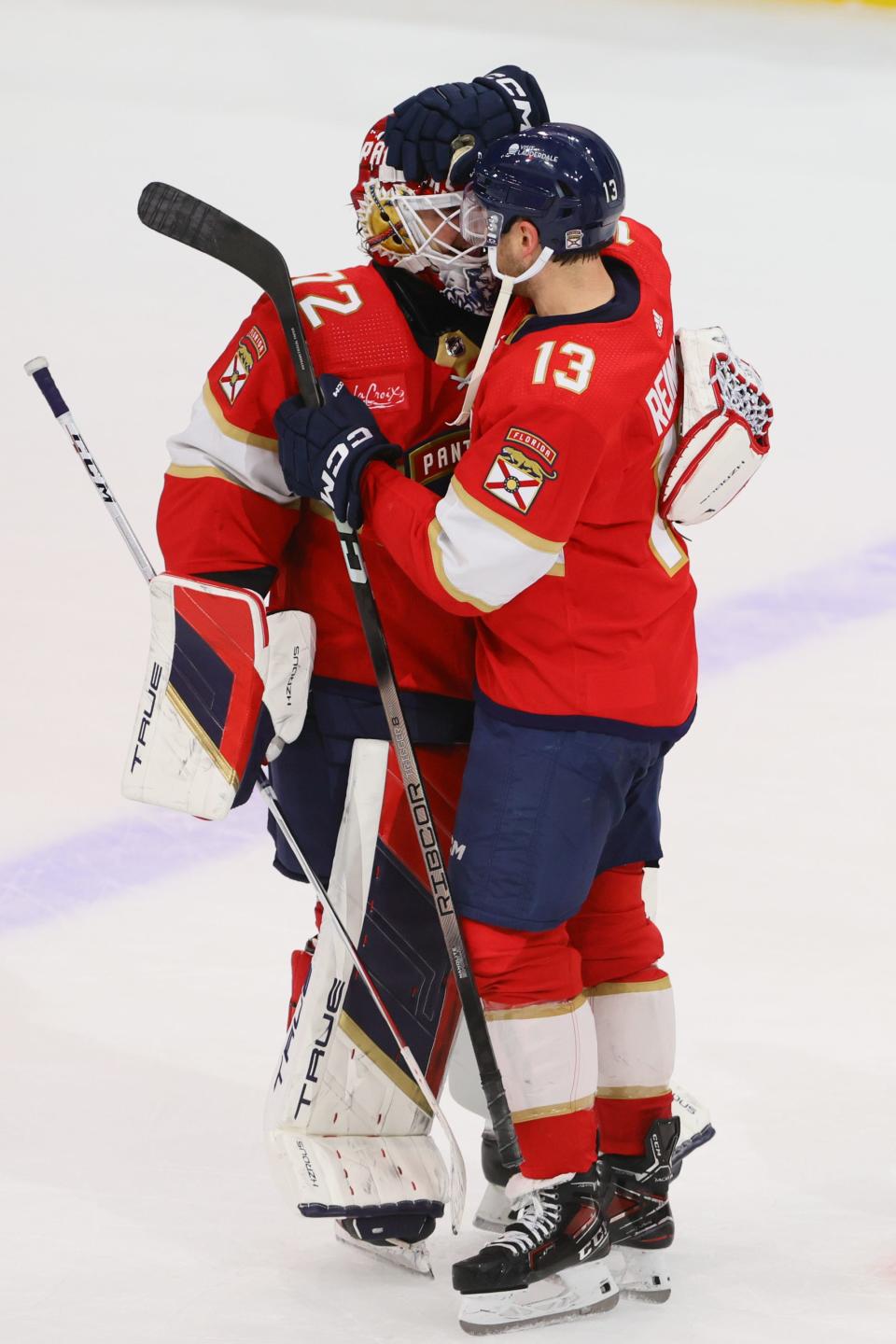 Apr 13, 2024; Sunrise, Florida, USA; Florida Panthers center Sam Reinhart (13) celebrates with Florida Panthers goaltender Sergei Bobrovsky (72) after the game against the Buffalo Sabres at Amerant Bank Arena. Mandatory Credit: Sam Navarro-USA TODAY Sports