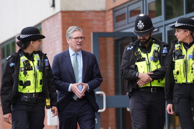 Prime Minister Sir Keir Starmer speaks with members of the West Midlands Police Force at Arden Academy in Solihull, West Midlands 