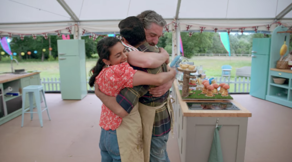 the final three bakers hugging