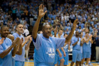 FILE - Former North Carolina Tar Heel Walter Davis acknowledges the crowd as he is introduced during the Celebration of a Century Friday, Feb. 12, 2010, at the Smith Center in Chapel Hill, N.C. Davis, a five-time NBA All-Star who had his number retired by the Phoenix Suns, has died. He was 69. Davis was star in college for North Carolina where he played for the late Dean Smith. The school's release said Walter Davis died Thursday morning, Nov. 2, 2023, of natural causes while visiting family in Charlotte, North Carolina. (AP Photo/The News & Observer, Robert Willett, File)